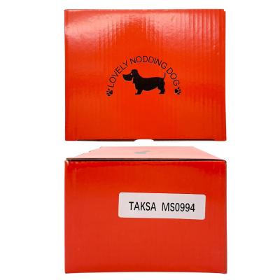 Игрушка на панель с качающейся головой "Такса"  