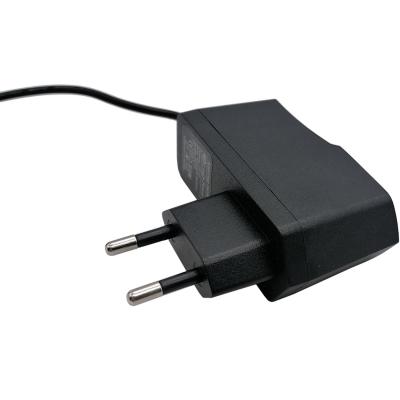 Блок питания импульсный  6,0V, 2,0A, 12W, вилка на блоке, LP10/LP91/LP188