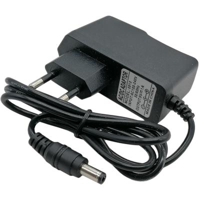 Блок питания импульсный  9,0V,  1,0A, 9W вилка на блоке  