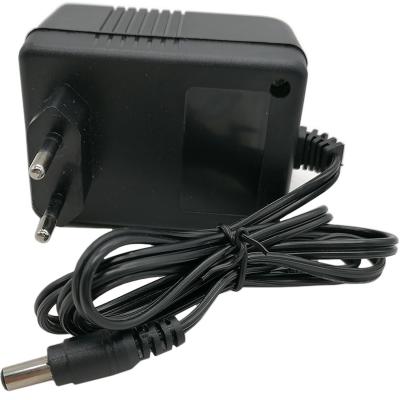 Блок питания трансформаторный 24,0V,  500mA, не стаб., вилка на блоке