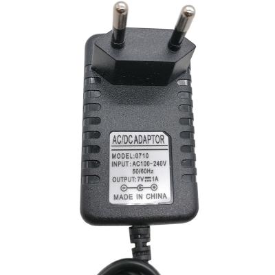 Блок питания импульсный  7,0V,  1,A, 2,5х5,5 мм, вилка на блоке**