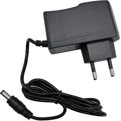 Блок питания импульсный 12,0V,  1,0A, 12W вилка на блоке /90140/**