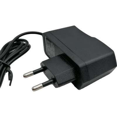 Блок питания импульсный 12,0V,  1,5A, 18W вилка на блоке  