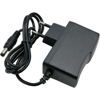 Блок питания импульсный  9,0V,  1,0A, 9W вилка на блоке  