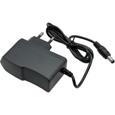Блок питания импульсный 12,0V,  1,0A, 12W вилка на блоке /90140/**