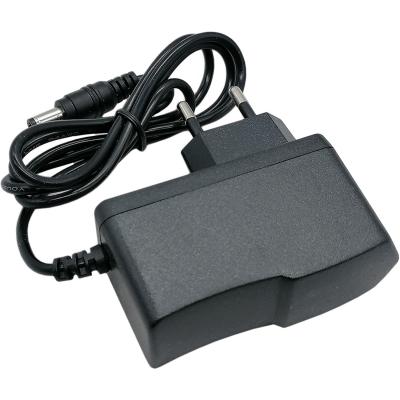 Блок питания импульсный  9,0V,  1,0A, 9W вилка на блоке  
